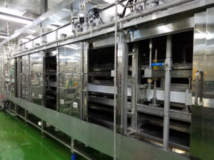 排出用スクリューコンベアで生地ロスを回収